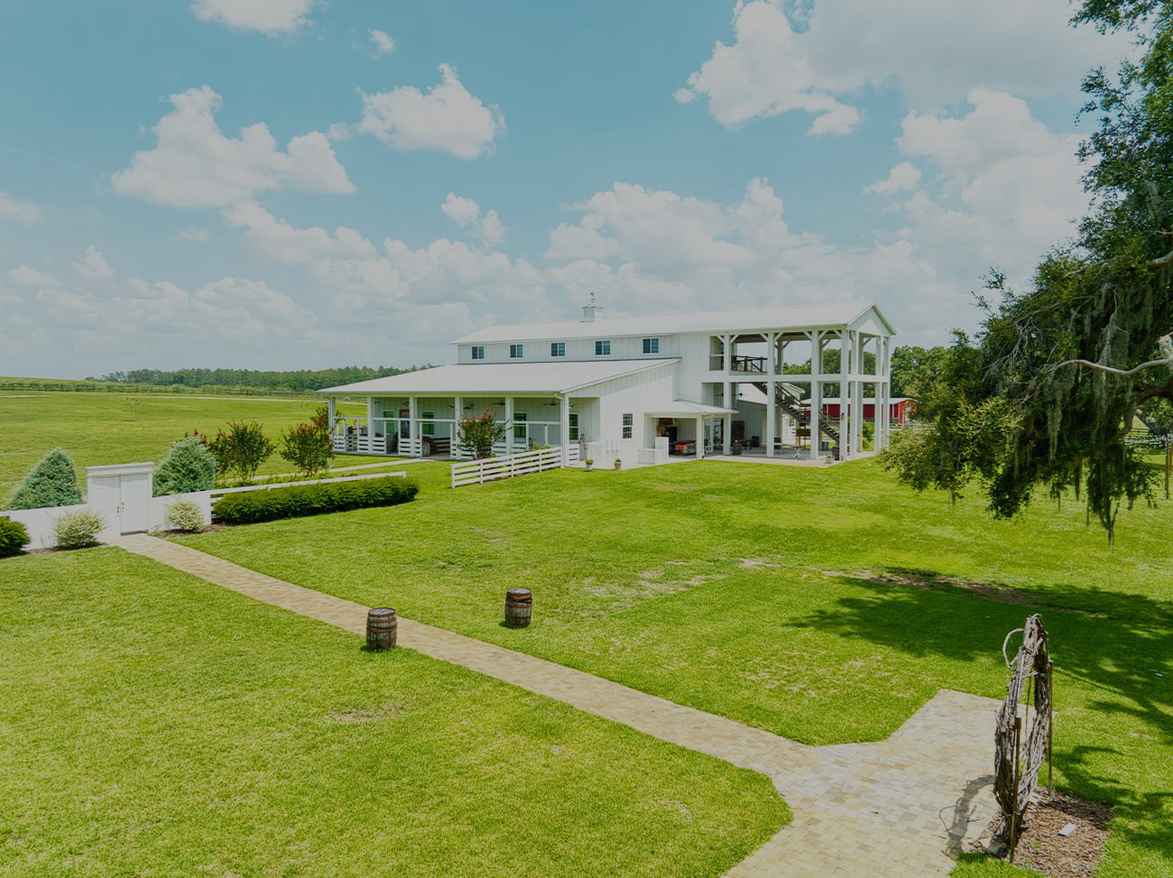 Wide view of Covington Farm’s barn, event lawn, and surrounding pastures in Dade City, Florida.